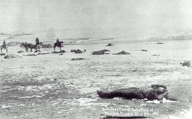 Victims of Wounded Knee Laying in The Snow (https://en.wikipedia.org/wiki/Wounded_Knee_Massacre)