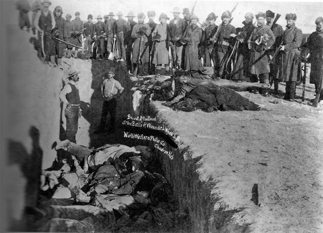Burial Pit at Wounded Knee (https://en.wikipedia.org/wiki/Wounded_Knee_Massacre)
